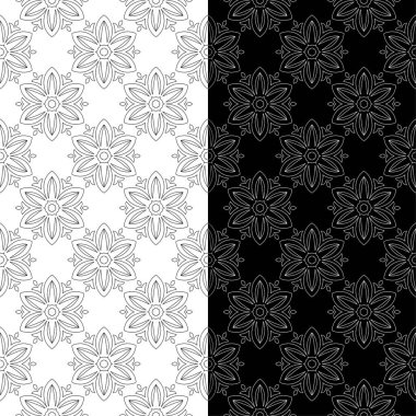Siyah ve beyaz çiçekli süsler. Tekstil ve duvar kağıtları için sorunsuz arka planlar kümesi