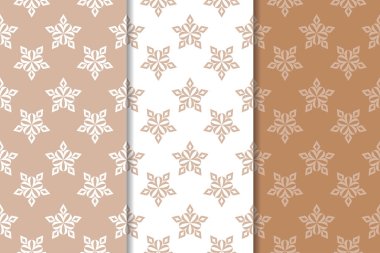 Kahverengi ve bej çiçek arka planlar kümesi. Tekstil ve duvar kağıtları için dikişsiz desen seti