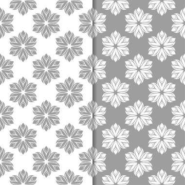 Beyaz ve gri çiçek arka planlar. Tekstil ve duvar kağıtları için dikişsiz desen seti