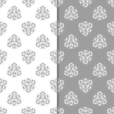 Beyaz ve gri çiçek süs tasarımlar. Tekstil ve duvar kağıtları için dikişsiz desen seti