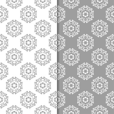Beyaz ve gri çiçek arka planlar. Tekstil ve duvar kağıtları için dikişsiz desen seti