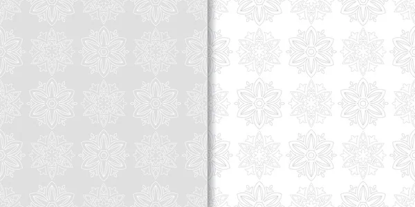薄い灰色の花背景 テキスタイルや壁紙のためのシームレスなパターンのセット — ストックベクタ