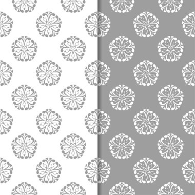 Beyaz ve gri arka plan çiçek kümesi. Tekstil ve duvar kağıtları için dikişsiz desen