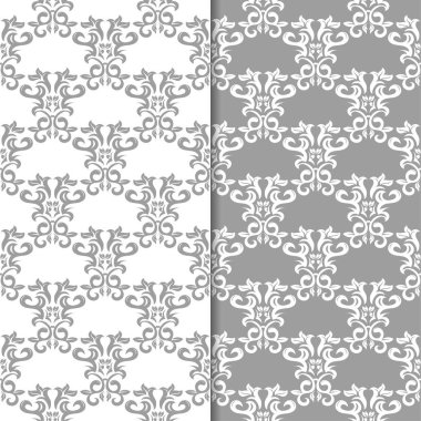 Beyaz ve gri çiçek süs tasarımlar. Tekstil ve duvar kağıtları için dikişsiz desen seti