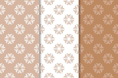 Kahverengi çiçek arka planlar. Tekstil ve duvar kağıtları için dikişsiz desen seti