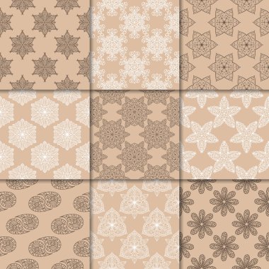 Kahverengi Bej çiçekli süsler. Kağıt için dikişsiz desen koleksiyonu Tekstil