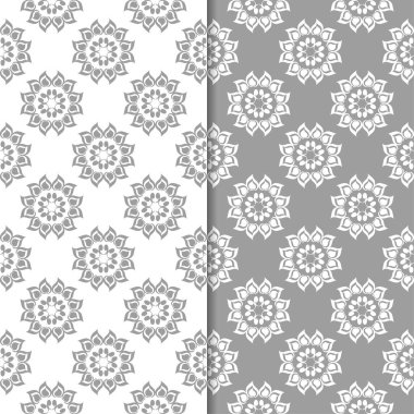 Beyaz ve gri arka plan çiçek kümesi. Tekstil ve duvar kağıtları için dikişsiz desen