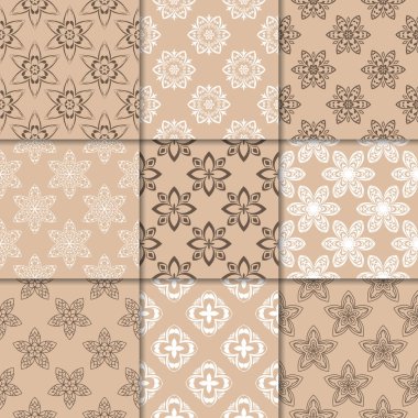 Kahverengi Bej çiçekli süsler. Kağıt için dikişsiz desen koleksiyonu Tekstil