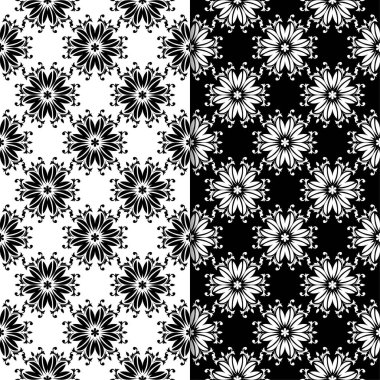 Siyah ve beyaz çiçekli süsler. Tekstil ve duvar kağıtları için sorunsuz arka planlar kümesi