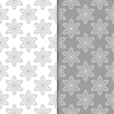 Beyaz ve gri çiçek süs tasarımlar. Tekstil ve duvar kağıtları için dikişsiz desen seti