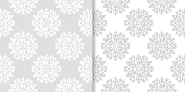 Işık gri ve beyaz çiçekli süsler. Tekstil ve duvar kağıtları için dikişsiz desen seti