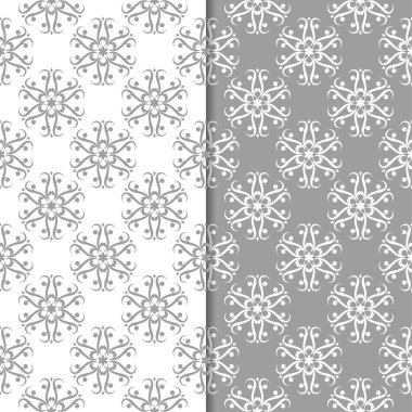 Beyaz ve gri çiçek arka planlar. Tekstil ve duvar kağıtları için dikişsiz desen seti