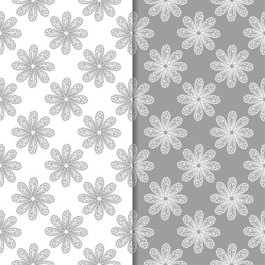 Beyaz ve gri çiçek arka planlar. Tekstil ve duvar kağıtları için dikişsiz desen seti