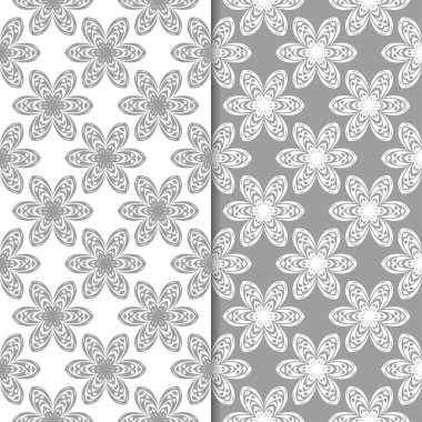 Beyaz ve gri çiçek süsler. Tekstil ve duvar kağıtları için sorunsuz arka planlar kümesi