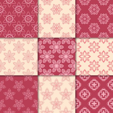 Kiraz kırmızı ve bej çiçekli süsler. Kağıt için dikişsiz desen koleksiyonu Tekstil