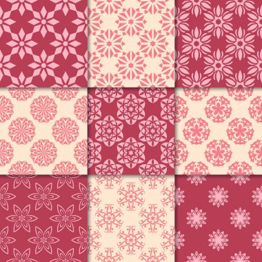 Kiraz kırmızı ve bej çiçekli süsler. Kağıt için dikişsiz desen koleksiyonu Tekstil