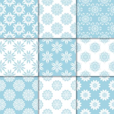 Mavi ve beyaz çiçekli süsler. Kağıt için dikişsiz desen koleksiyonu Tekstil