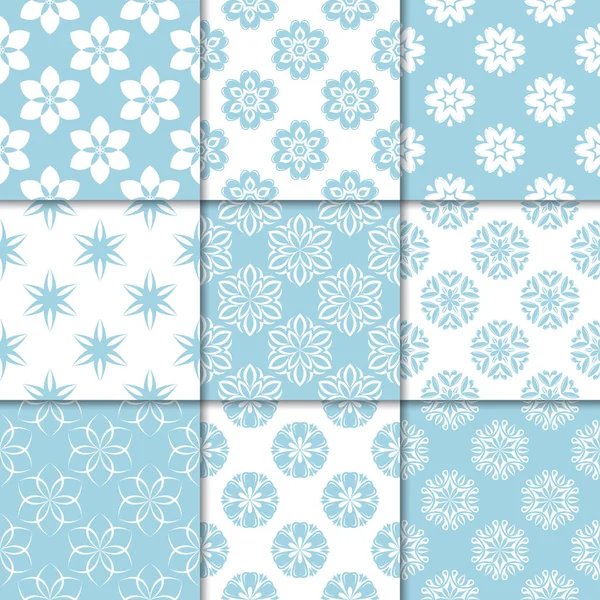 Mavi ve beyaz çiçekli süsler. Kağıt için dikişsiz desen koleksiyonu Tekstil