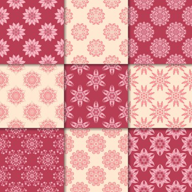 Kiraz kırmızı ve bej çiçekli süsler. Kağıt için dikişsiz desen koleksiyonu Tekstil