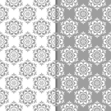 Beyaz ve gri çiçek arka planlar. Tekstil ve duvar kağıtları için dikişsiz desen seti