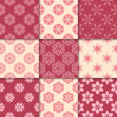 Kiraz kırmızı ve bej çiçekli süsler. Kağıt için dikişsiz desen koleksiyonu Tekstil