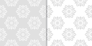 Işık gri ve beyaz çiçekli süsler. Tekstil ve duvar kağıtları için dikişsiz desen seti