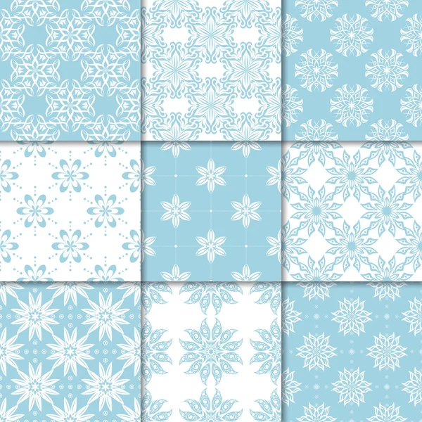 Mavi ve beyaz çiçekli süsler. Kağıt için dikişsiz desen koleksiyonu Tekstil