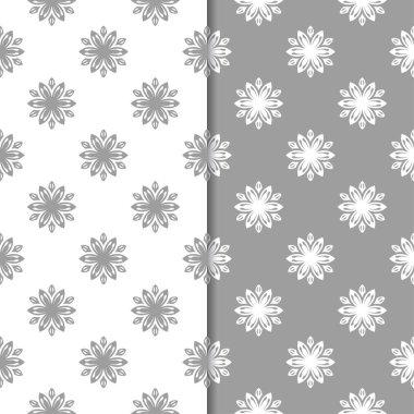 Beyaz ve gri çiçek arka planlar. Tekstil ve duvar kağıtları için dikişsiz desen seti