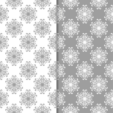 Beyaz ve gri çiçek süs tasarımlar. Tekstil ve duvar kağıtları için dikişsiz desen seti