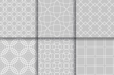 Kesintisiz geometrik desenler. Tekstil, kumaş veya duvar kağıtları koleksiyonu gri arka planları