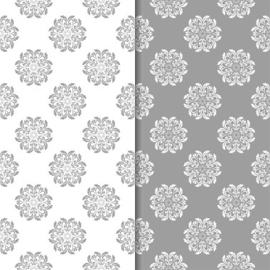 Beyaz ve gri arka plan çiçek kümesi. Tekstil ve duvar kağıtları için dikişsiz desen