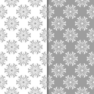 Beyaz ve gri çiçek arka planlar. Tekstil ve duvar kağıtları için dikişsiz desen seti