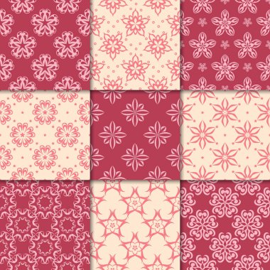 Kiraz kırmızı ve bej çiçekli süsler. Kağıt için dikişsiz desen koleksiyonu Tekstil