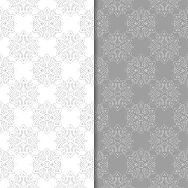 Beyaz ve gri çiçek süsler. Tekstil ve duvar kağıtları için sorunsuz arka planlar kümesi