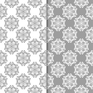 Beyaz ve gri çiçek arka planlar. Tekstil ve duvar kağıtları için dikişsiz desen seti