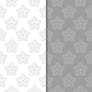 Beyaz ve gri çiçek arka planlar. Tekstil ve duvar kağıtları için dikişsiz desen seti