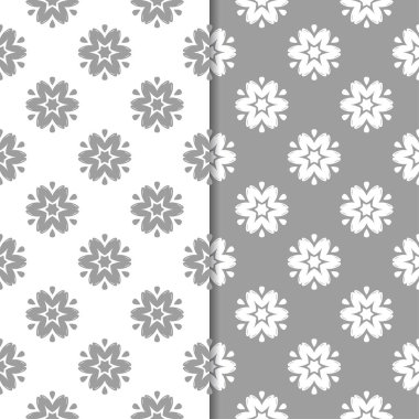 Beyaz ve gri çiçek arka planlar. Tekstil ve duvar kağıtları için dikişsiz desen seti