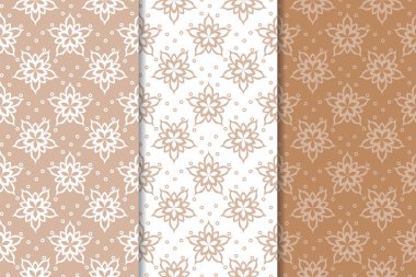 Kahverengi ve bej çiçek arka planlar kümesi. Tekstil ve duvar kağıtları için dikişsiz desen seti