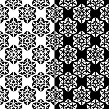 Siyah ve beyaz çiçekli süsler. Tekstil ve duvar kağıtları için sorunsuz arka planlar kümesi