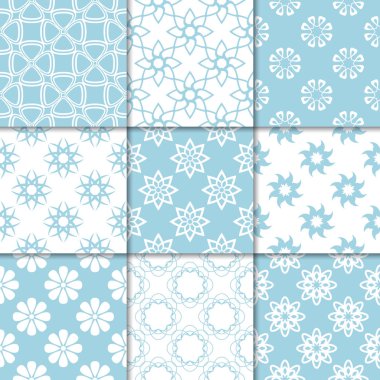 Mavi ve beyaz çiçekli süsler. Kağıt için dikişsiz desen koleksiyonu Tekstil