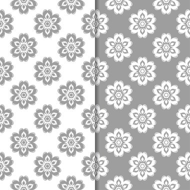 Beyaz ve gri çiçek arka planlar. Tekstil ve duvar kağıtları için dikişsiz desen seti
