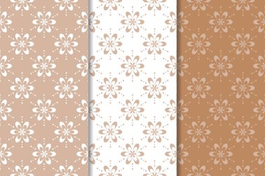 Kahverengi çiçek arka planlar. Tekstil ve duvar kağıtları için dikişsiz desen seti