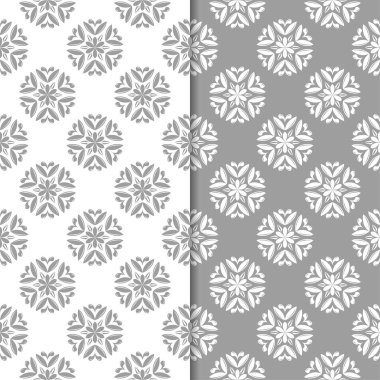 Beyaz ve gri çiçek süs tasarımlar. Tekstil ve duvar kağıtları için dikişsiz desen seti