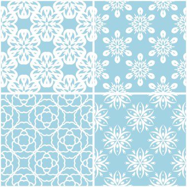 Çiçek desenleri. Mavi ve beyaz sorunsuz arka planlar kümesi. Vektör çizim