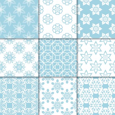 Mavi ve beyaz çiçekli süsler. Kağıt için dikişsiz desen koleksiyonu Tekstil