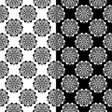 Siyah ve beyaz çiçekli süsler. Tekstil ve duvar kağıtları için sorunsuz arka planlar kümesi