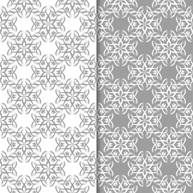 Beyaz ve gri çiçek arka planlar. Tekstil ve duvar kağıtları için dikişsiz desen seti