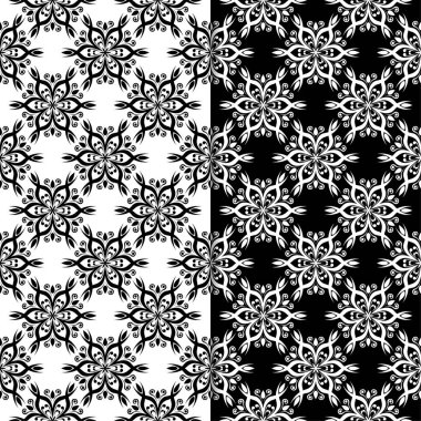 Siyah ve beyaz çiçekli süsler. Tekstil ve duvar kağıtları için sorunsuz arka planlar kümesi