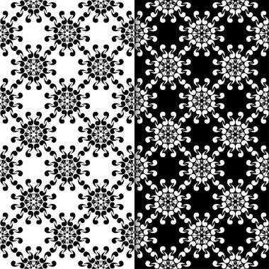 Siyah ve beyaz çiçekli süsler. Tekstil ve duvar kağıtları için sorunsuz arka planlar kümesi