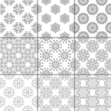 Gri ve beyaz çiçekli süsler. Kağıt için tarafsız Dikişsiz desen koleksiyonu Tekstil